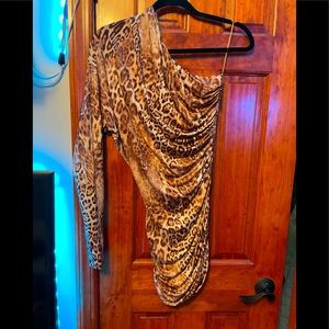 Torn by Ronny Kobo long sleeve one shoulder leopard mini dress.